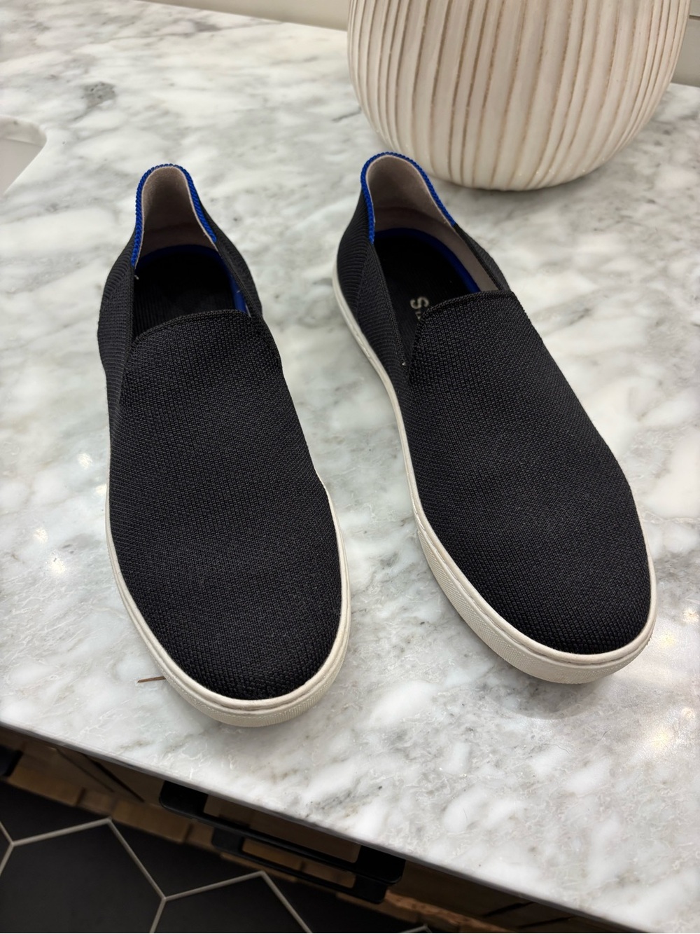 Rothy's Black Slip-On Sneakers with Blue Collar Trim